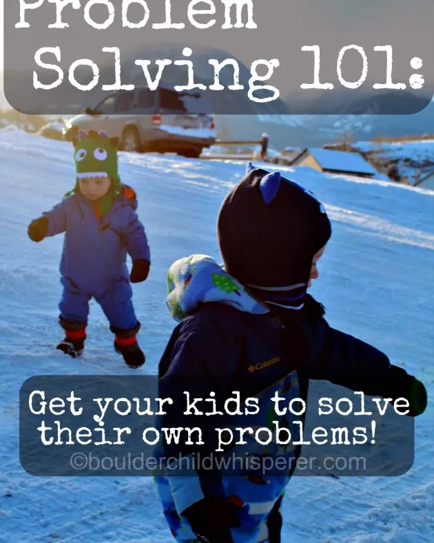 A child pauses to think independently before solving a small building block challenge.