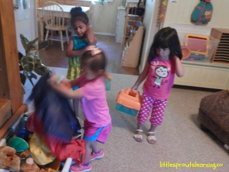 Low storage bins with pictorial labels help children learn to clean up independently.