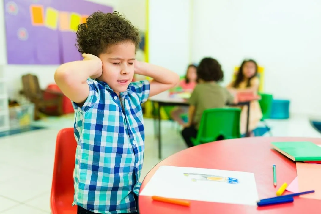 A parent validating their child's feelings through calm and attentive emotional coaching.
